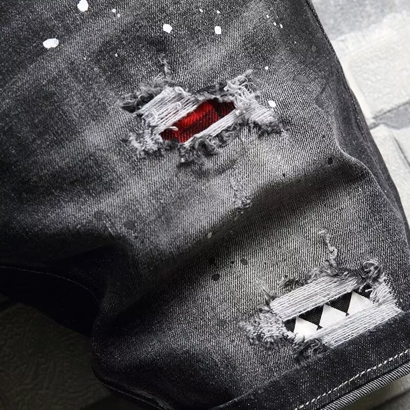Black Paint-Splattered Denim Shorts with Rips and Patches
